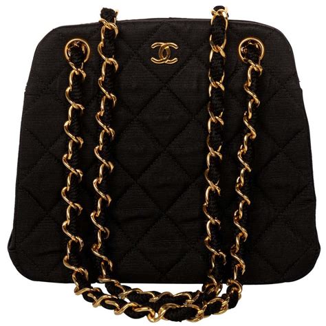 chanel bag with black chain|small black quilted chanel bag.